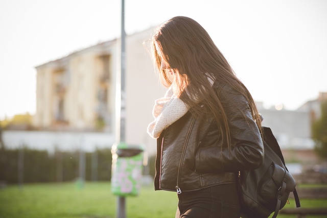 young beautiful long hair woman in town