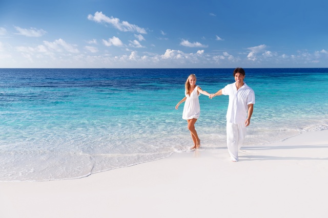 Happy couple on the beach