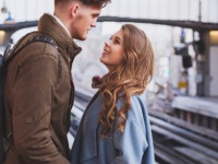 long distance relationship, couple on platform at the train station, meeting or parting concept