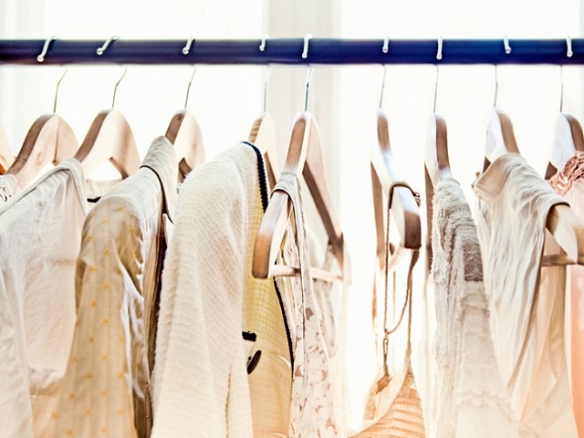 Hangers with clothes