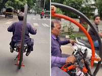 メン・イン・ブラックのジャイロサイクルに似た乗り物で街を走る男性にタイムトラベラー疑惑が浮上