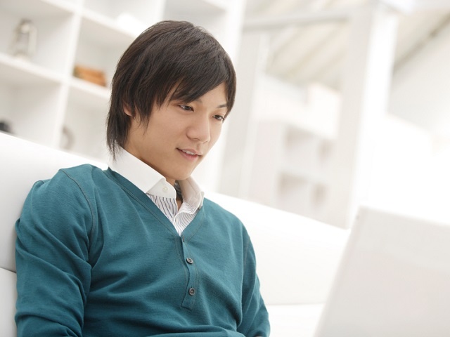 Man looking at PC