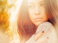 Outdoor atmospheric fashion photo of young beautiful lady in autumn landscape