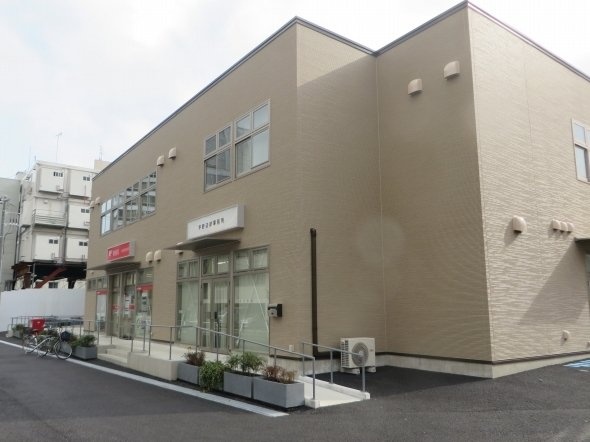 プレハブの仮設店舗(16年2月撮影)