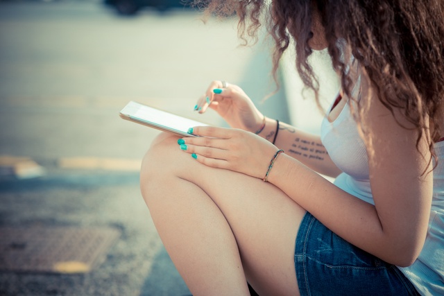young beautiful long curly hair hipster woman