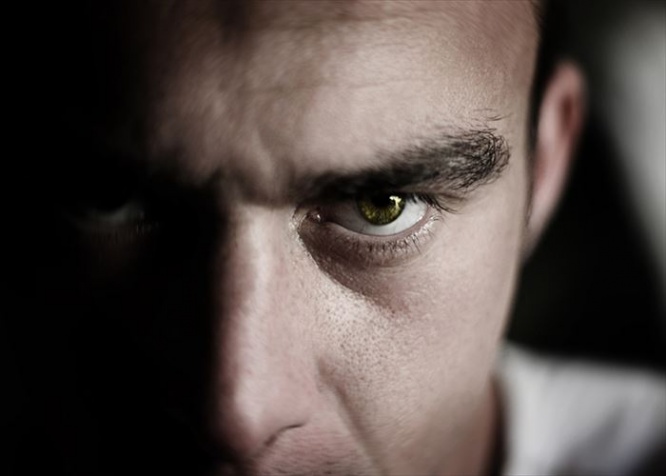 Dark person - focus on creepy eye