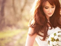 Beautiful bride outdoors in a forest.