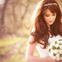 Beautiful bride outdoors in a forest.