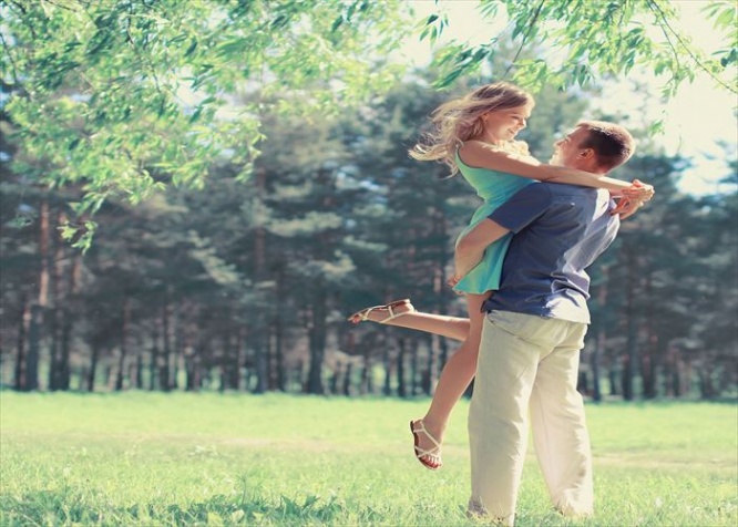 Sweet couple in love in spring sunny day