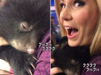 こんな音もだせるのか！？「クルクル...クククク....」人間に抱っこされて喉をならすクマの赤ちゃん
