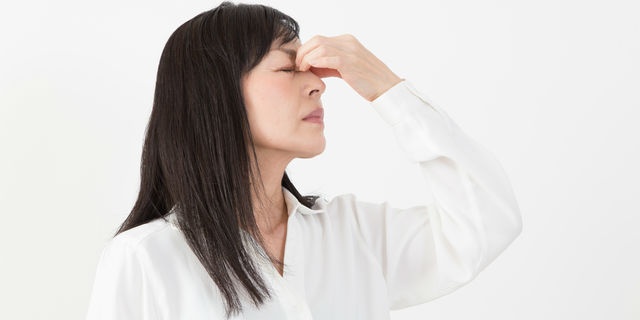 めまいの女性