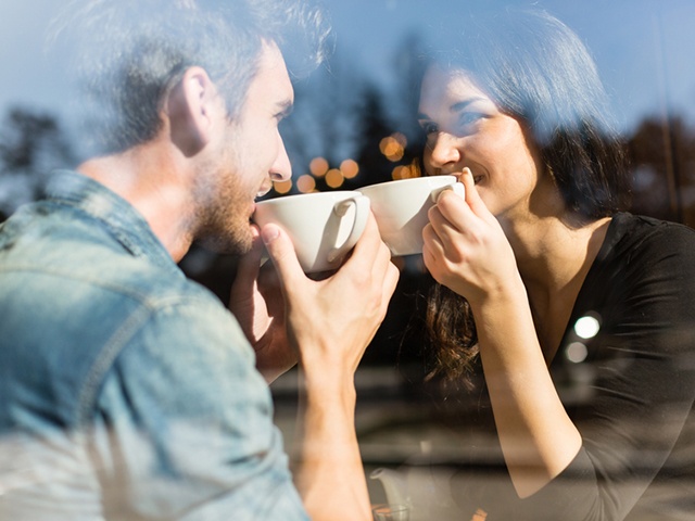 Couple enjoying tea in a restaurant
