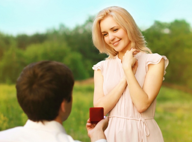 Romantic couple in love, ring, engagement, wedding - concept