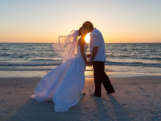 Bride and Groom Married Couple Sunset Beach Wedding