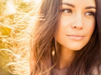 Outdoor atmospheric fashion photo of young beautiful lady in autumn landscape