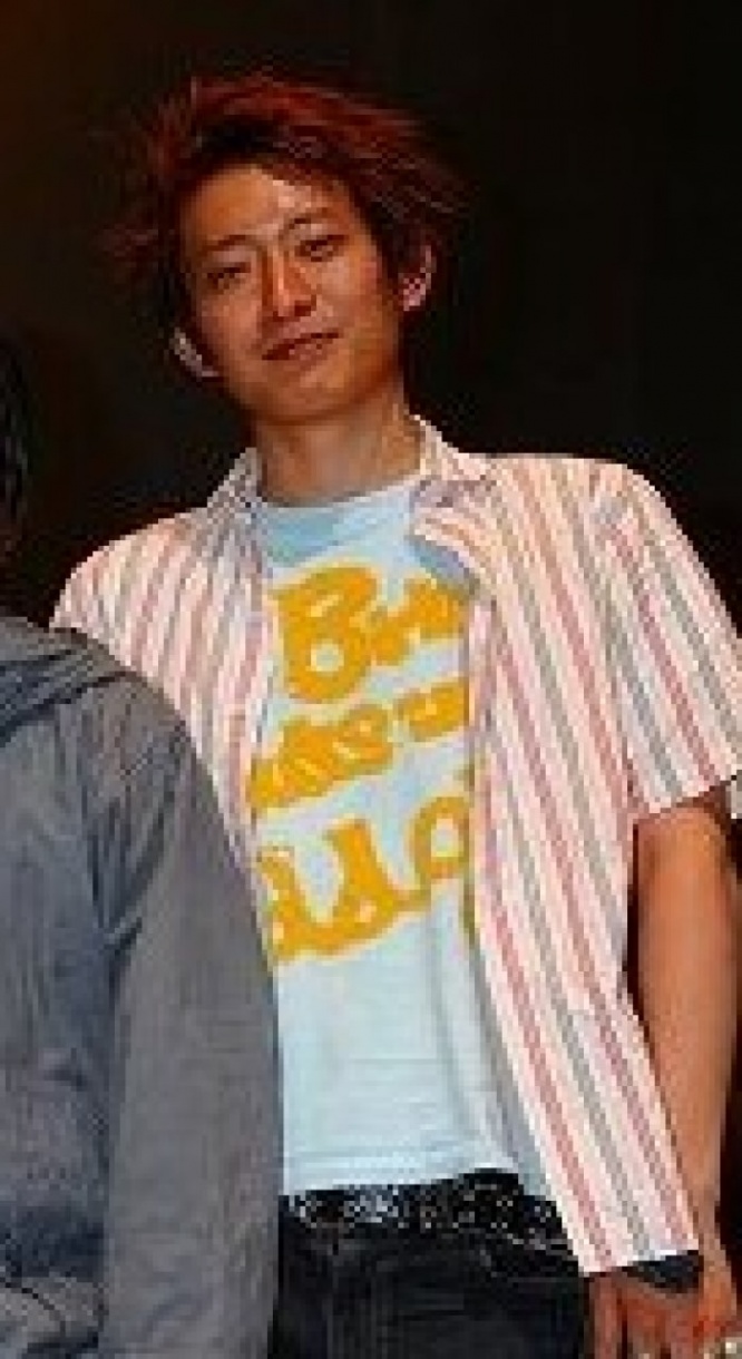 谷賢一