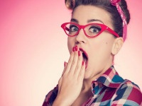 Portrait of shocked pin-up girl