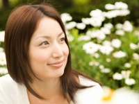 Woman surrounded by flowers