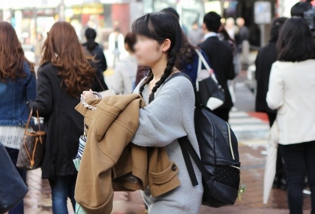 分厚いコートはちょっとした大荷物である