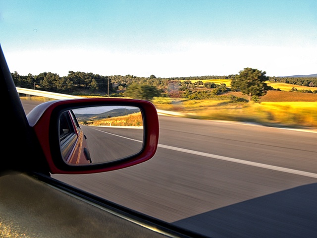 view from side of fast moving car