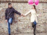 Romantic Young Couple Holding Hands