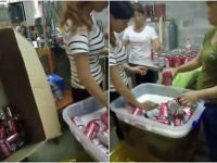 ネットに流出した映像の一部。女たちが次々と缶にビールを入れている