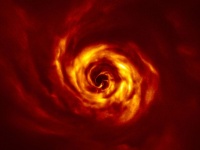 サウロンの目かな。520光年の彼方で惑星が誕生する瞬間をとらえた写真（ヨーロッパ南天天文台）