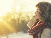 Woman enjoying a winter day on mountains