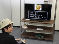 仕事そっちのけで「舛添要一　朝までファミコン」をプレイするT編集長。本人いわく「これが今の僕の仕事なんだよ！原稿書くんだから勘弁してよ！」