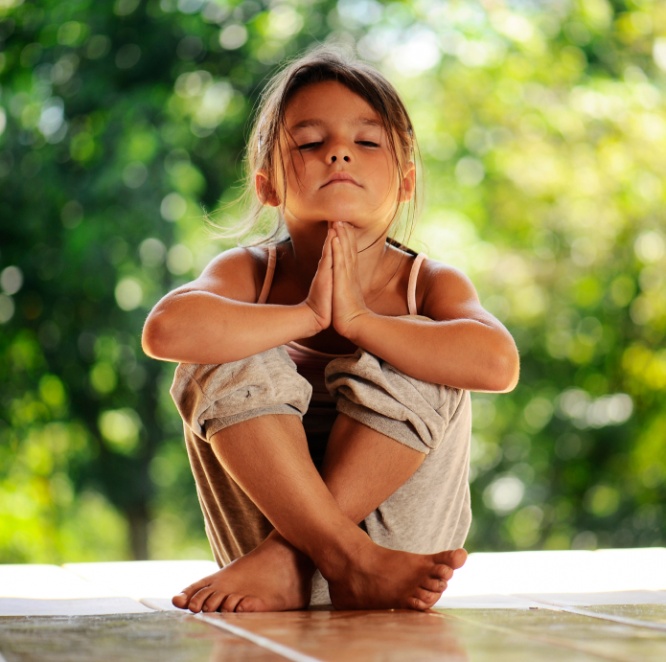 girl on meditation in the morning park