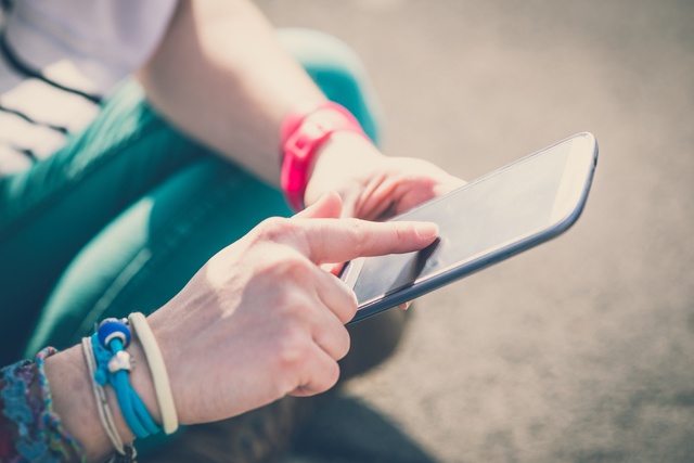 close up of hands woman using smart phone