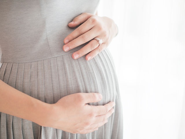 Closeup photo of pregnant woman