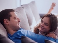 Lovely couple in pyjamas spending Valentine's day at home