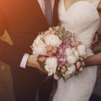 lovely blond summer wedding couple in sunny weather