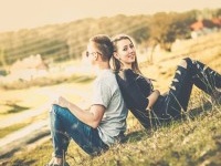 Girlfriend with her boyfriend outdoor in the forest