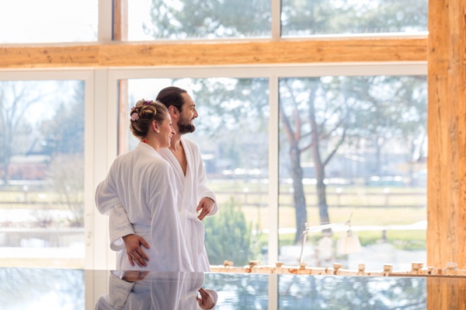 Couple enjoying view on wellness spa pool