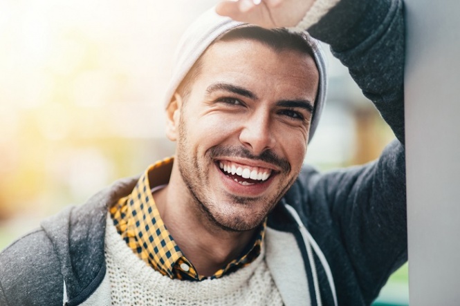 Happy young man outdoors