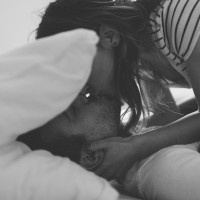 Lovely couple in pyjamas is getting ready for a good night sleep sealed with a kiss