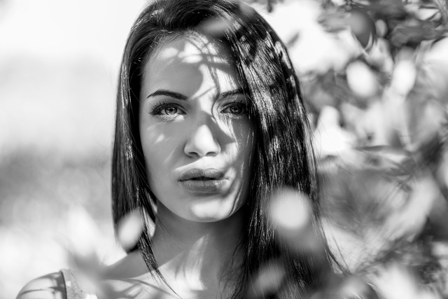 Young woman with green eyes in urban background