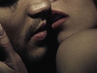 Photo of sensual kissing young couple