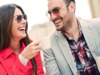 Happy young couple enjoying a coffee at the coffee shop.