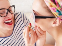 Young women preparing for party