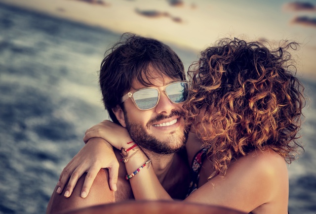 Happy lovers sailing