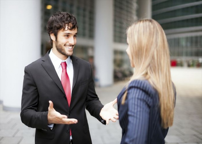 Businessman talking to a woman