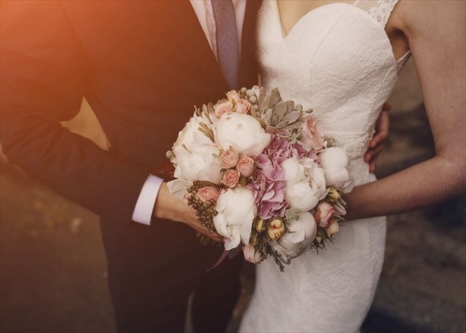 lovely blond summer wedding couple in sunny weather