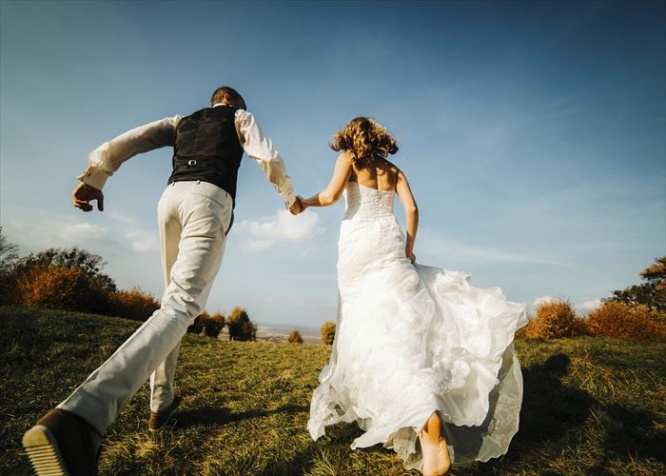 beautiful couple having fun on the lawn