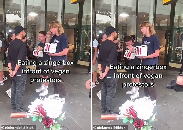 ヴィーガンデモの前でチキンを食う