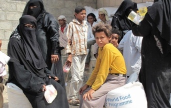 イエメンでの食糧支援（紛争開始以前に撮影）　Copyright WFP