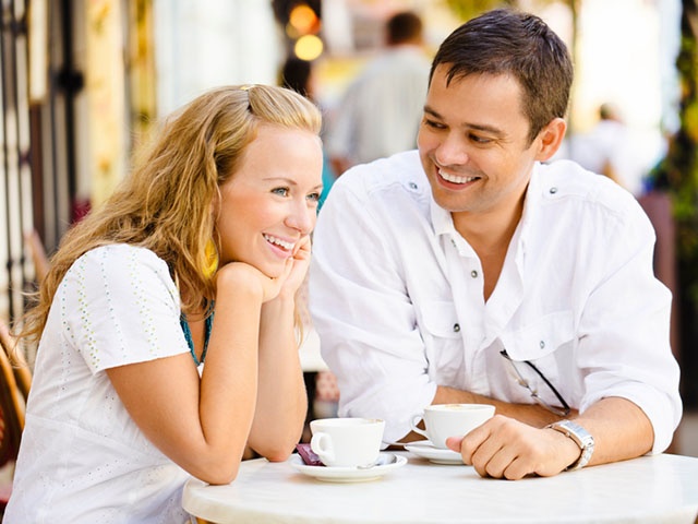 Happy couple having a coffee break