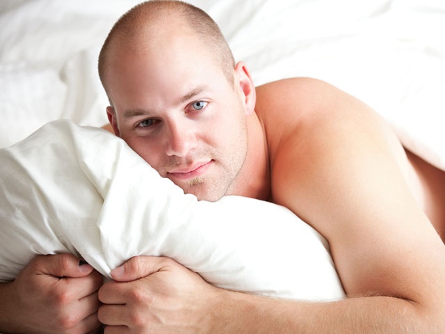Young Man in Bed